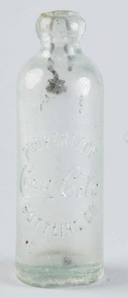 Early Coca-Cola Bottling Co. Hutch Bottle.: Some nicks to top, chips to base, medium wear, some staining, and minor marks. Size: 7 - 1/4" T.