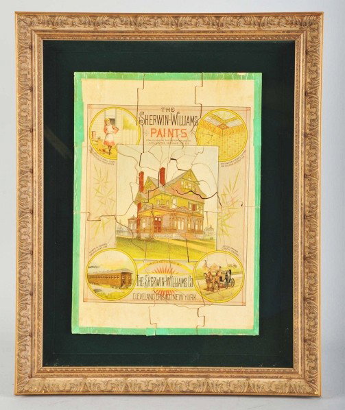 Wooden Sherwin-Williams Paints Puzzle.: Circa 1890s. Paper over wooden blocks. Beautifully matted and framed under glass in showcase mounting. Great graphics of house. Green paper border appears to be all original. Only light soiling or min