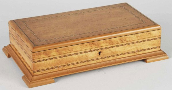 La Corona Cuban Cigar Humidor with Key.: 1950s. Lovely curly maple. Size: 3 - 1/2" x 13 - 1/2" x 8".