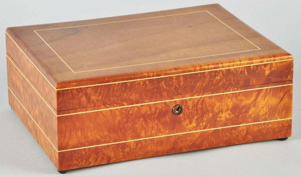 Cuban Burled Maple Partagas Humidor.: 1930 to 1940. With original humidification device and glass liner. Size: 4" x 11" x 8 - 1/2".