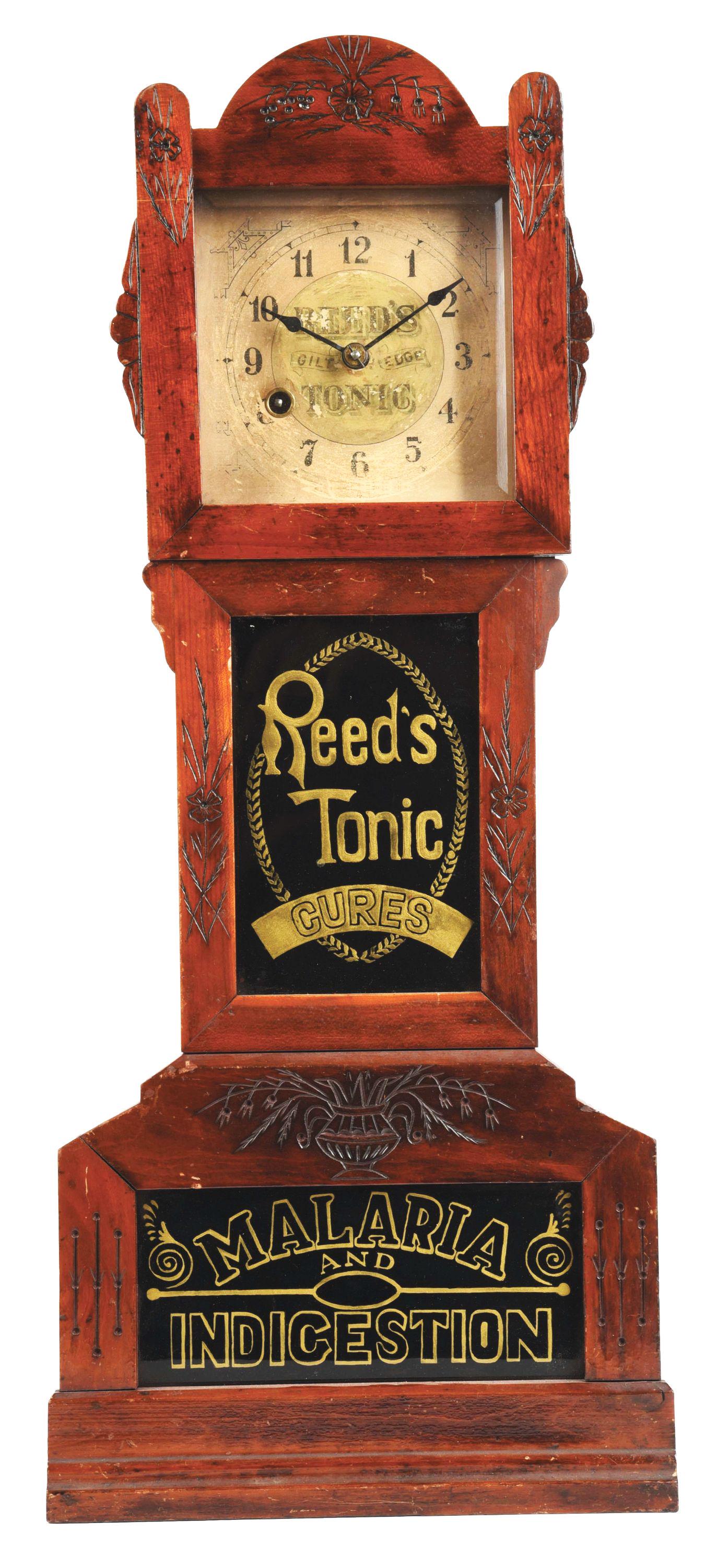 WOODEN AND GLASS REED'S TONIC CLOCK. (1 of 7)