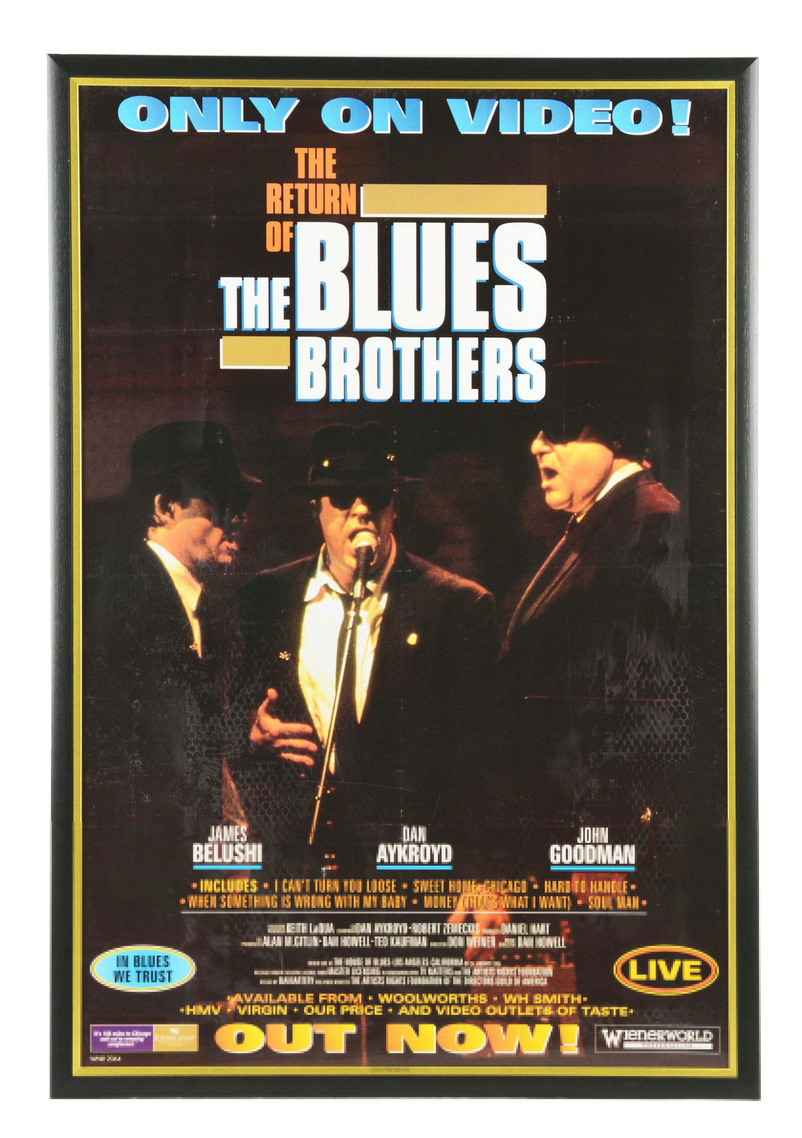 FRAMED BLUES BROTHERS MUSIC POSTER.: Great video poster for "The Return of The Blues Brothers" featuring Dan Aykroyd, James Belushi, and John Goodman. Top and bottom advertise "Only On Video!" and "Out Now!". Poster features small mark t