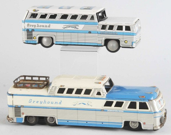 Lot of 2: Tin Greyhound Scenicruiser Bus Toys.: Japanese. Friction mechanisms are working. Both marked "Made in Japan". One is a scarce model with lithographed luggage on roof and the second one has lithographed scenes of the Golden Gate Bridge, Ma