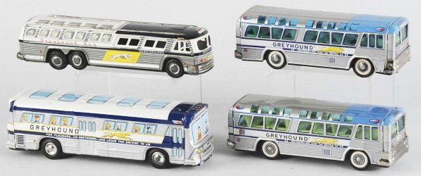 Lot of 4: Tin Greyhound Bus Friction Toys.: Japanese. Working. One with passengers lithographed in windows. Very little wear overall. Size: Largest: 11 - 1/4" L.