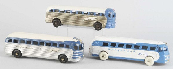 Lot of 3: Diecast Greyhound Lines Bus Toys.: Made by Realistic Toy Company. All three toys have been nicely restored. One with replaced Arcade rubber tires. Size: Largest: 9 - 1/4" L.