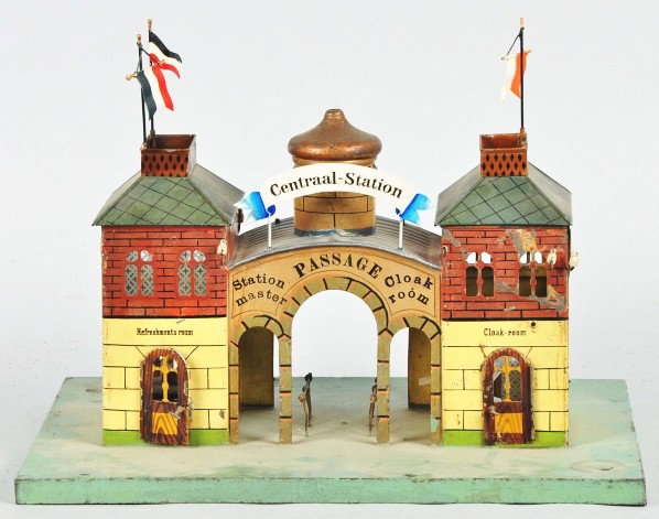 Handpainted Marklin Onion Dome Train Station.: German. English lettering. Marked "Central Station" on front. Missing top finial, roof insulators, and two sets of windows. Flags and front sign are replacements.
