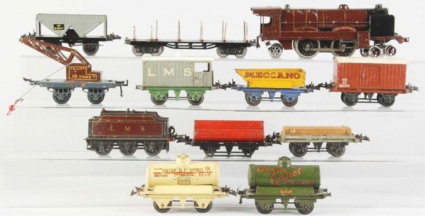 Lot of 12: Hornby Train Engines & Cars.: English. Pre-war. O-gauge. Includes no. 6100 Royal Scott engine and matching LMS Royal Scott tender. Some paint loss and wear throughout.