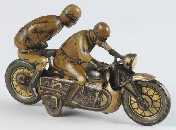 Tin Litho Motorcycle Wind-Up Toy.: German. Working. Marked "CKO Made in US Zone Germany". Original headlight. Nice action toy with passenger swaying back and forth when in operation. Some scratching and wear throughout. Size: 5 - 1/2"