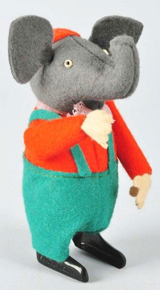 Scarce Schuco Elephant Wind-Up Toy.: German. Working. Marked "Schuco" on feet. Original clothing and felt ears. Very little to no wear. Size: 4 - 1/2" T.