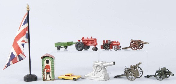 Large Lot of Miscellaneous Metal Vehicle Toys.: Includes tractor set, some military guns, various Tootsietoy vehicle trains, busses, and cars. Various conditions throughout with paint chipping and wear to most and a few are broken. Not all pictured