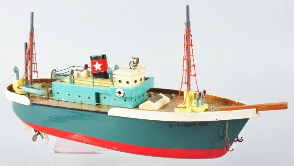 Vintage Wooden Boat Battery-Operated Toy.: Japanese. Working. Marked "S.S. Cape Cod" on both sides of front. Includes both original masts. Some spots of line cracking. Size: 17" L.