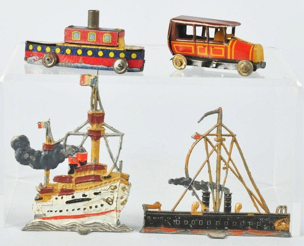 Lot of 4: Vehicle Toys.: Japanese. Pre-war. Includes tin litho boat penny toy, tin litho car penny toy, and two diecast flats of battleships. Some wear overall. Size: Largest: 3 - 1/2" T.