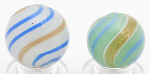 Lot of 2: Semi-Opaque Banded Lutz Marbles.: Largest is a white semi-opaque base with dark blue lines and the smaller marble is a green semi-opaque base with baby blue band. Size: 11/16" & 3/4" Dia.