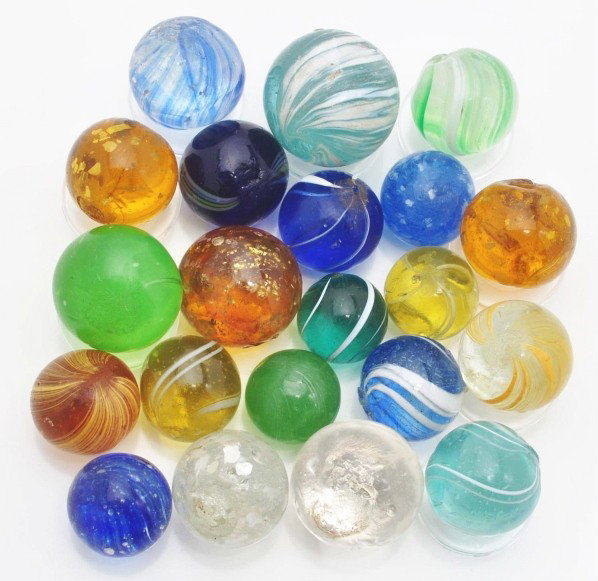 Lot of 20: Handmade Marbles.: Lot includes micas, mists with mica, mists, banded transparents, coreless color glass swirls, and handmade clearies. Size: Range: 9/16" to 13/16" Dia.