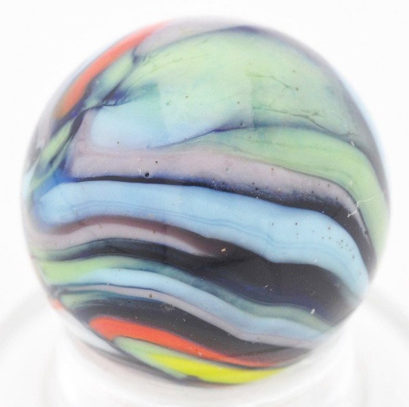 Christensen Agate Cobalt Guinea Marble.: Very nice striking and spotting. This marble has two pinch lines and is a very attractive guinea. Size: 9/16" Dia.