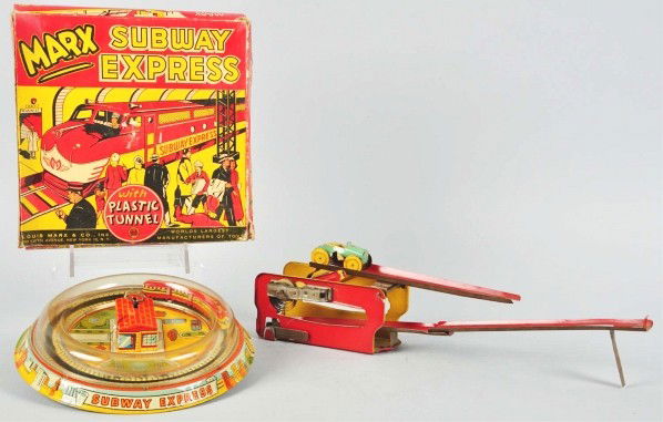 Lot of 2: Tin Litho Wind-Up Toys.: American. Includes one Marx Subway Express with nice colorful lithographed base in original box with some creasing. Not working. Also includes one early over-and-under toy with original car. Size: Lar