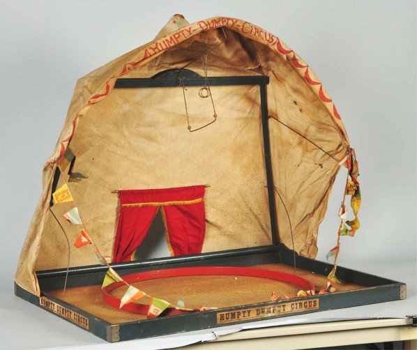 Schoenhut Humpty Dumpty Circus Tent & Platform.: Animals are not included. Flag is missing. Some staining and wear throughout. Size: 36" x 25".