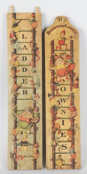 Early Palmer Cox Brownie Ladder Toy.: Depicts the Brownies on a ladder surrounded by the ABCs. Includes a Brownie Daruma figure. Some cracking and staining to paper. Size: 30 - 3/4" L.