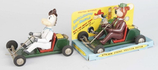 Lot of 2: Tin Linemar Character Go-Mobile Toys.: Japanese. Friction mechanisms are working. Tin cars and bodies with vinyl heads. Includes one Yogi Bear and one Quick Draw McGraw. Some scratching and wear to Quick Draw. Yogi has his original header 