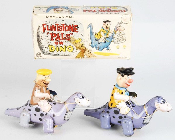 Lot of 2: Tin Flintstone's Riding Wind-Up Toys.: Japanese. Made by Linemar. All tin with vinyl heads. Includes Fred Flintstone and Barney Rubble riding Dino. Includes one original box with some creasing and tearing. Size: Each: 8" L.