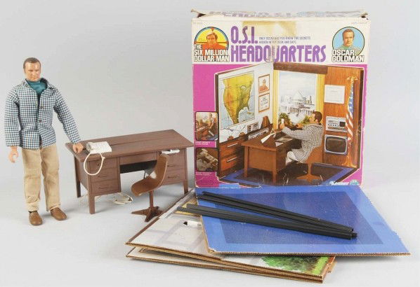 Lot of 2: Character Toys.: 1970s. Includes one Ideal Mr. Machine that is unopened in its original box marked "1977" and one unused Kenner Six Million Dollar Man Headquarters Set with Oscar Goldman figure and instruction sheet.