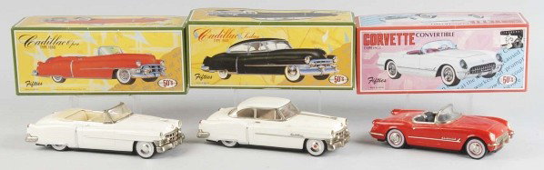 Lot of 3: Tin Automobile Friction Toys.: Japanese. Working. Includes two Cadillacs and one Corvette. Old store stock. Size: Largest Box: 12 - 1/2" x 5 - 1/4".
