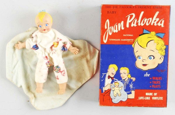 Joan Palooka Baby Doll.: Old store stock. Includes original box with insert and birth certificate dated "1952". Box marked "National Mask & Puppet Corp." and "Ham Fisher". Size: Box: 12" x 8 - 1/4".