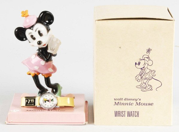 Disney Timex Minnie Mouse Wristwatch on Stand.: Working. Watch is in unused condition with original 7.95 price sticker on band. Very little wear overall. Includes original box with insert and Minnie Mouse figure. Old store stock. Size: Box: 6" x 4 