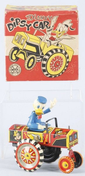Tin Marx Disney Donald Duck Dipsy Car Wind-Up Toy: American. Working. Tin car with plastic head. Minor scratching and wear throughout. Includes original box with pictures of Mickey Mouse and Donald Duck. Box has some overall creasing. Size: 6" L.