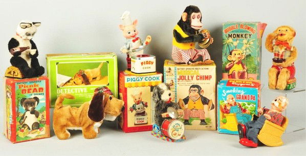 Lot of 7: Japanese Battery-Operated Toys.: Working. Toys with their original boxes include Smoking Grandpa, Picnic Bear, Musical Jolly Chimp, Bubble Blowing Monkey, Piggy Cook, and Detective Dog made in Taiwan. Also includes one Drumming Puppy