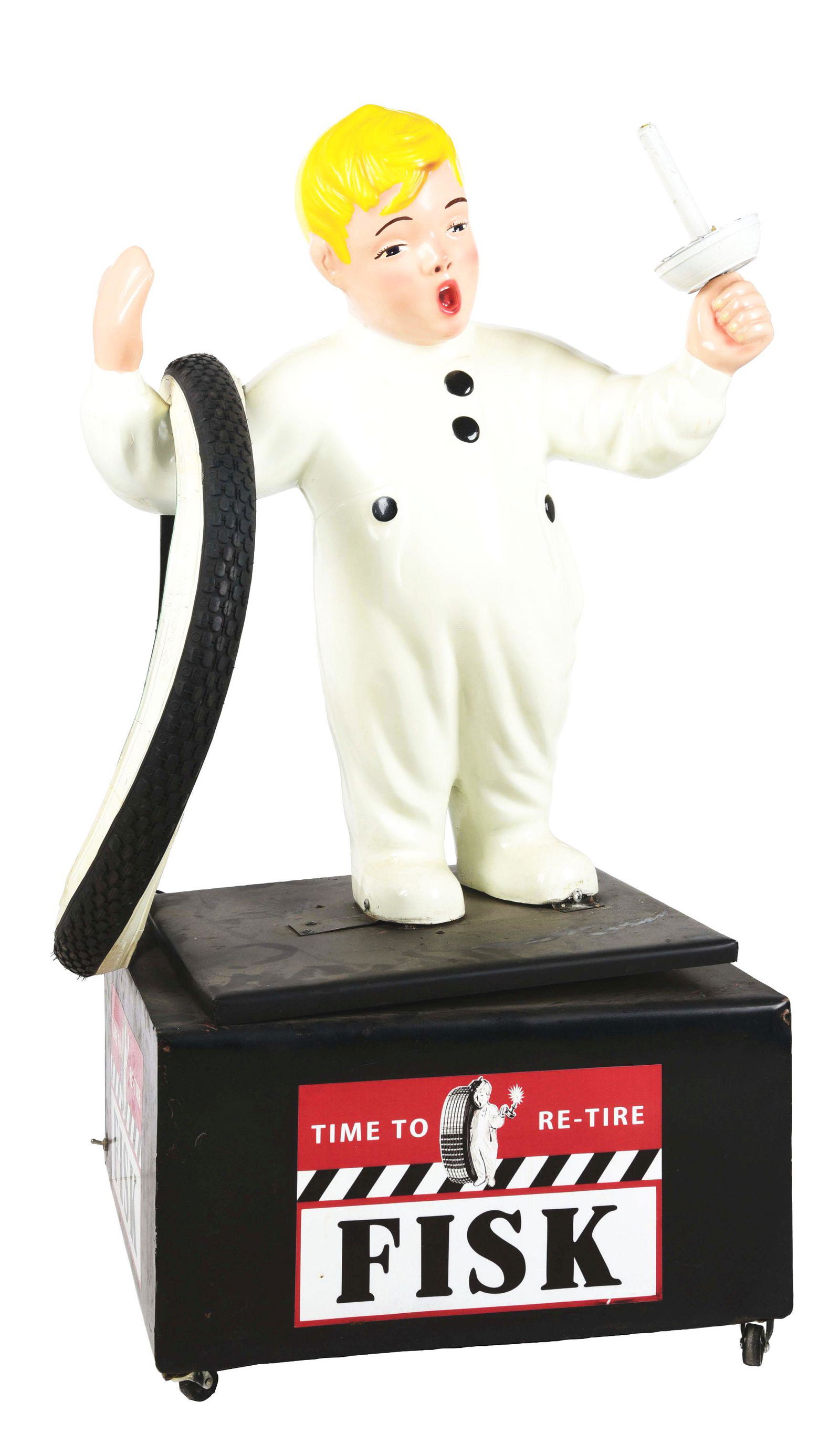 ANIMATED FISK BOY DISPLAY.: This Fisk boy is in excellent condition - believed to be original along with the original Fisk tire - added onto a mobile platform that would allow the boy to move. Reads "Fisk Tires Sold Here" on the