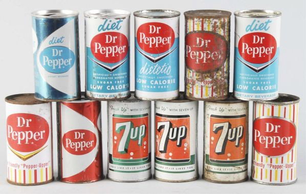 Lot of 11: Assorted Dr. Pepper & 7up Cans.: Description 1950s to 1970s. Nice assorted graphics. Some overall wear, rust, marks, and one or two missing tops. Condition (Fair - Excellent). Size Each: 5" T.