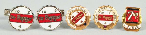 Lot of 5: Soda Jewelry Items.: Description Includes four Dr. Pepper and one 7up, a set of 1960s Dr. Pepper cufflinks, a Dr. Pepper ten year service pin, a five year service pin and a 7up Liter pin. All pieces are nicely enameled an