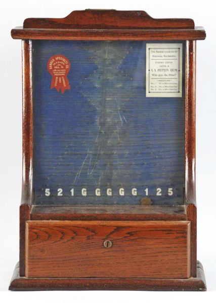 Banner Specialty Company Coin Maze Gum Machine.: Description Working. Condition (Excellent Plus). Size 19" x 13 - 1/2" x 3 - 3/4".