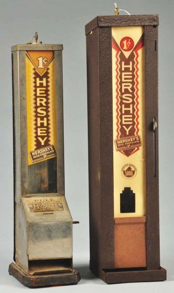 Lot of 2: Hershey's 1¢ Chocolate Bar Dispensers.: Description Both are working. Condition (Very Good - Excellent). Size Largest: 19 - 1/2" T.