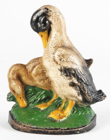 Cast Iron Two Ducks Doorstop.: Description Made by Hubley. Condition (Excellent). Size 8 - 1/4" T.