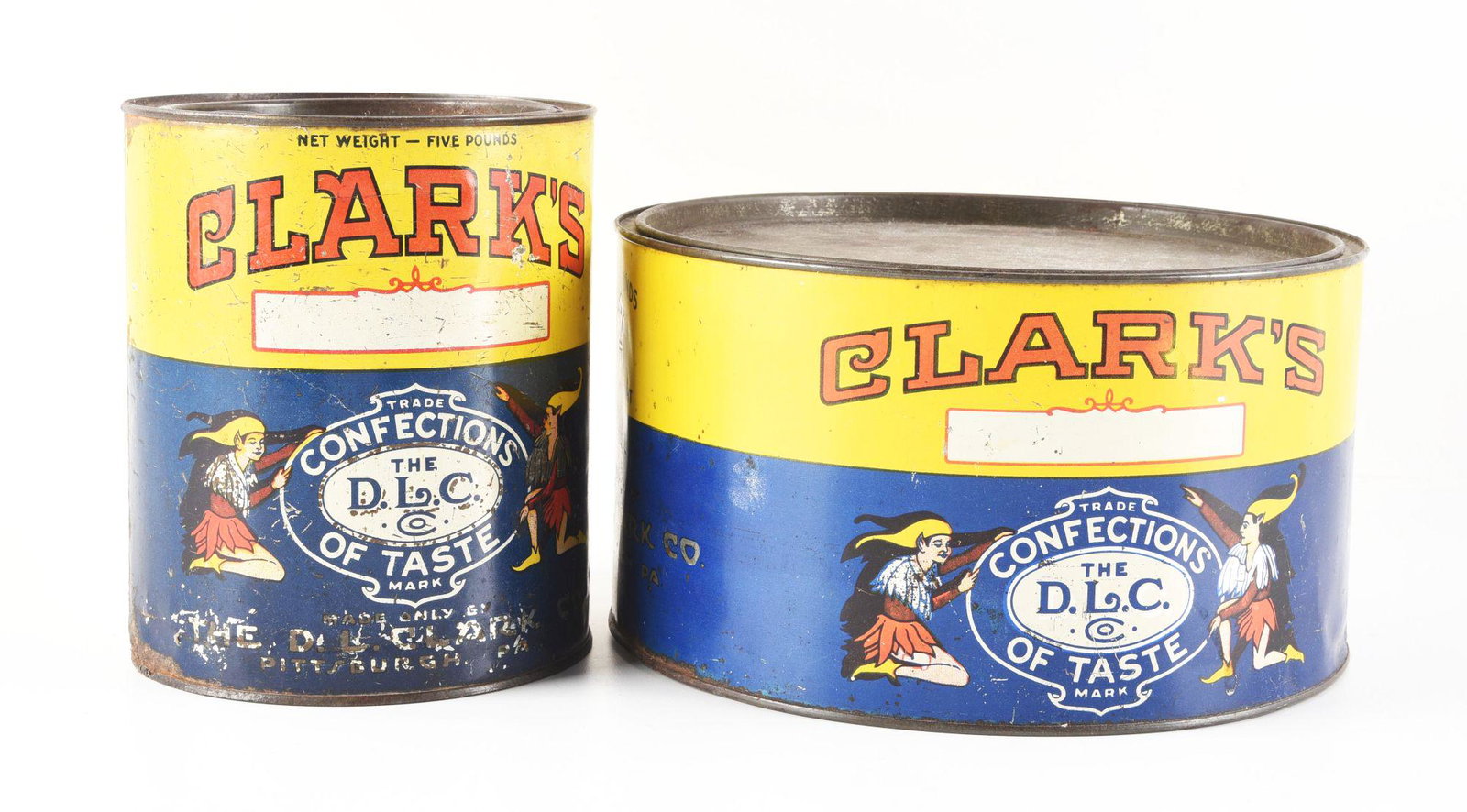 LOT OF 2: CLARK'S CANS.: This is a lot of two Clark's cans for confections. They have great graphics and strong color. The smaller can has significant wear to it, but overall they are both in excellent condition. Condition: D