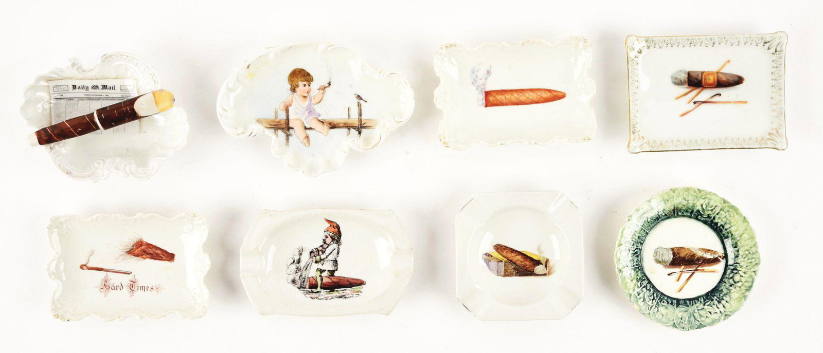 LOT OF 8: CIGAR RELATED ASHTRAYS.: This is a lot of eight cigar-related ashtrays, seven of which have a graphic of a cigar in the ashtray and one has a young child smoking a pipe. All ashtrays are ceramic or china. All are very good co