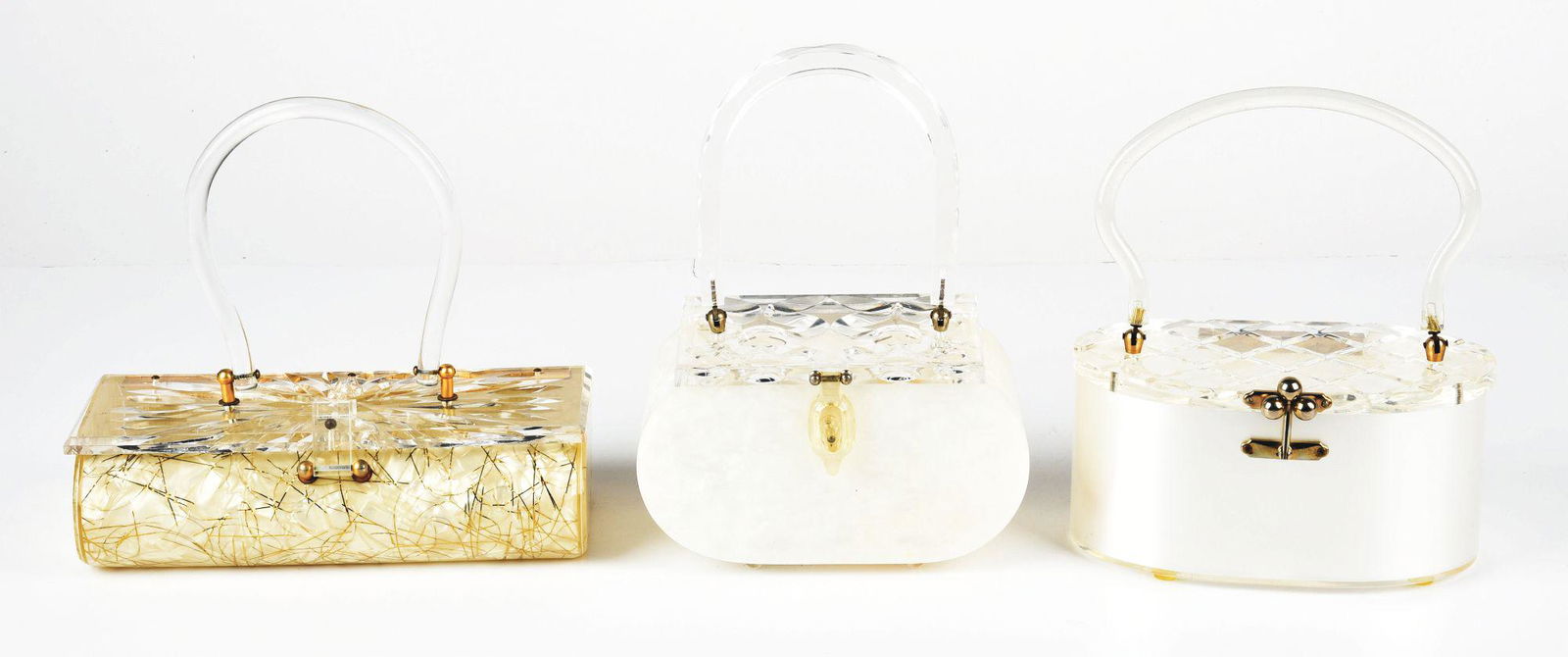 LOT OF 3: FROSTED LUCITE HANDBAGS. (1 of 2)