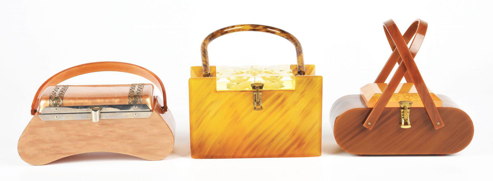 LOT OF 3: LLEWELLYN AND MISC. BROWN LUCITE BAGS. (1 of 2)