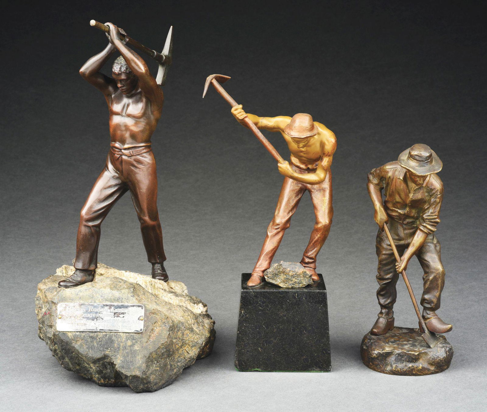 LOT OF 3: FIGURAL BRONZE SCULPTURES OF ROAD AND FIELD WORKERS. (1 of 7)