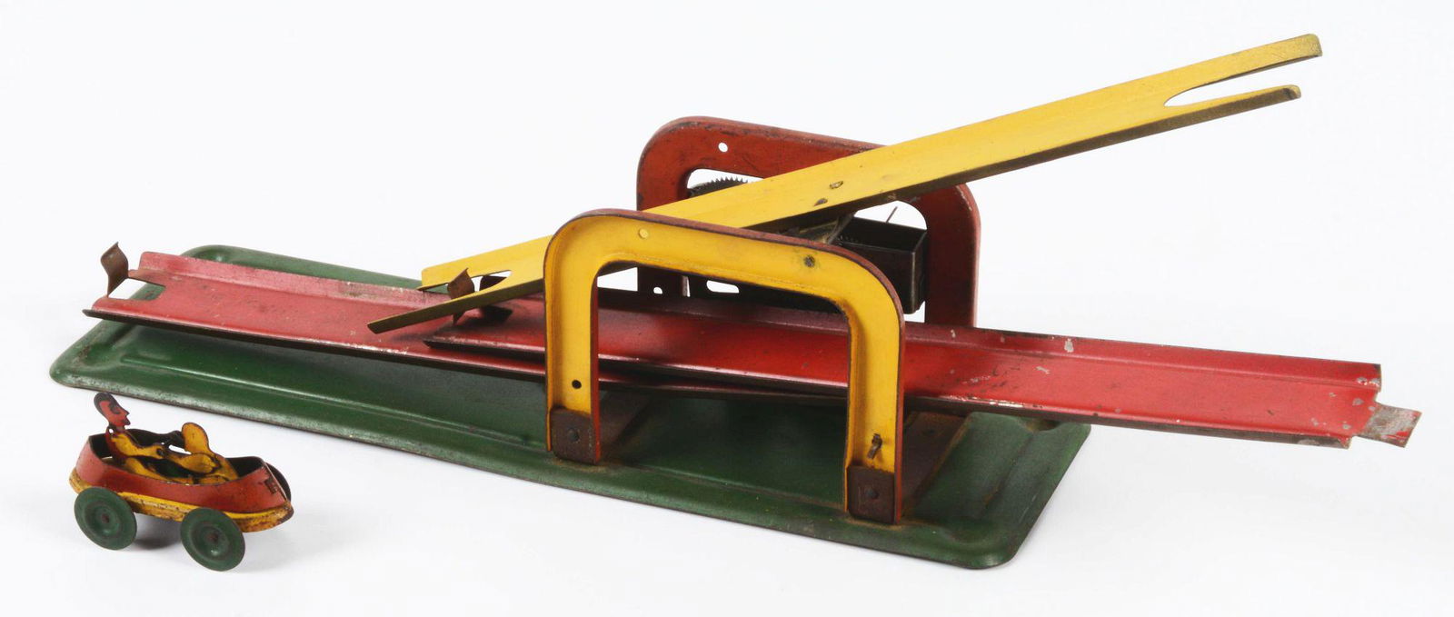 VERY UNUSUAL PRESSED STEEL WIND-UP SEESAW COASTER TOY. (1 of 3)