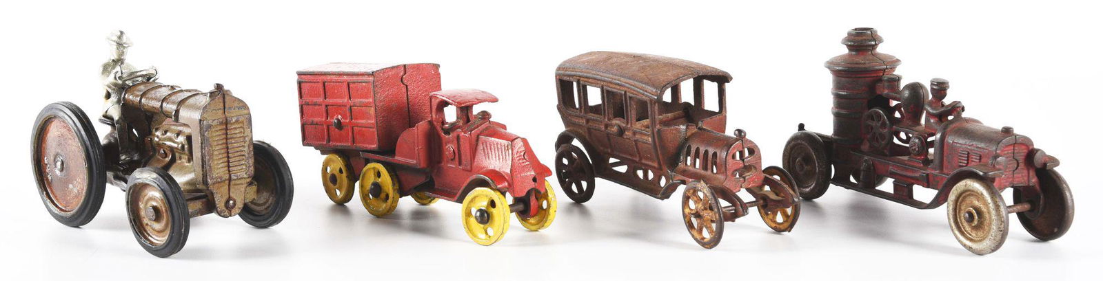LOT OF 4: VARIOUS AMERICAN-MADE CAST IRON VEHICLES. (1 of 3)