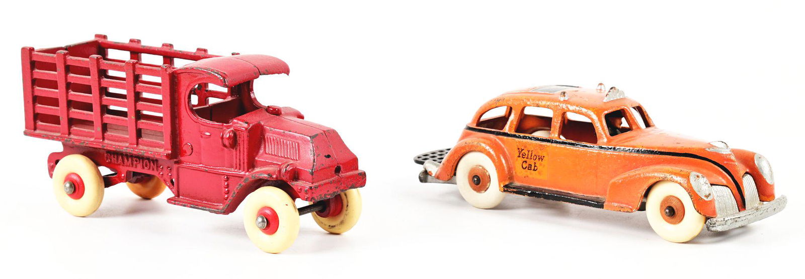 LOT OF 2: AMERICAN-MADE CAST IRON CHAMPION AND HUBLEY VEHICLE TOYS. (1 of 3)