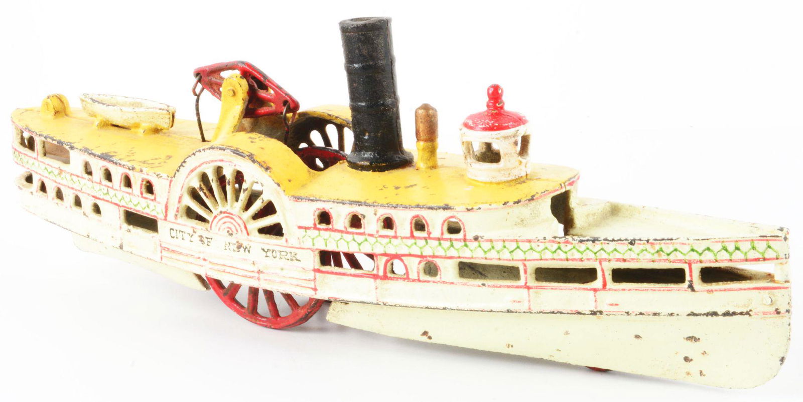 CAST IRON CITY OF NEW YORK PADDLE WHEEL TOY. (1 of 3)