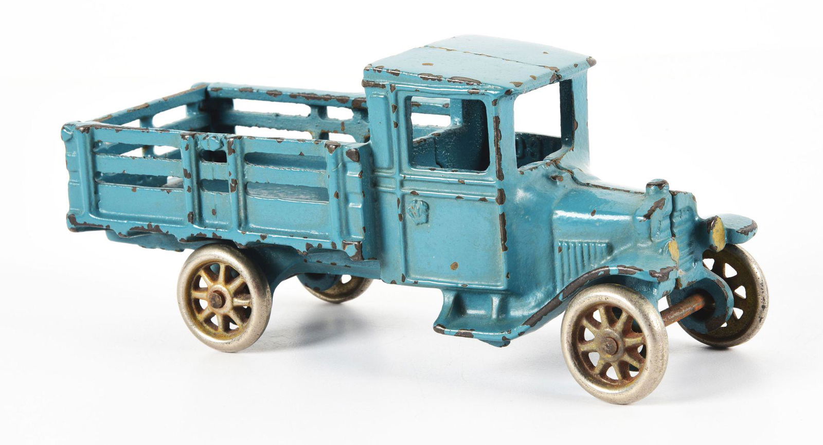 CAST IRON ARCADE STAKE BACK TRUCK. (1 of 3)