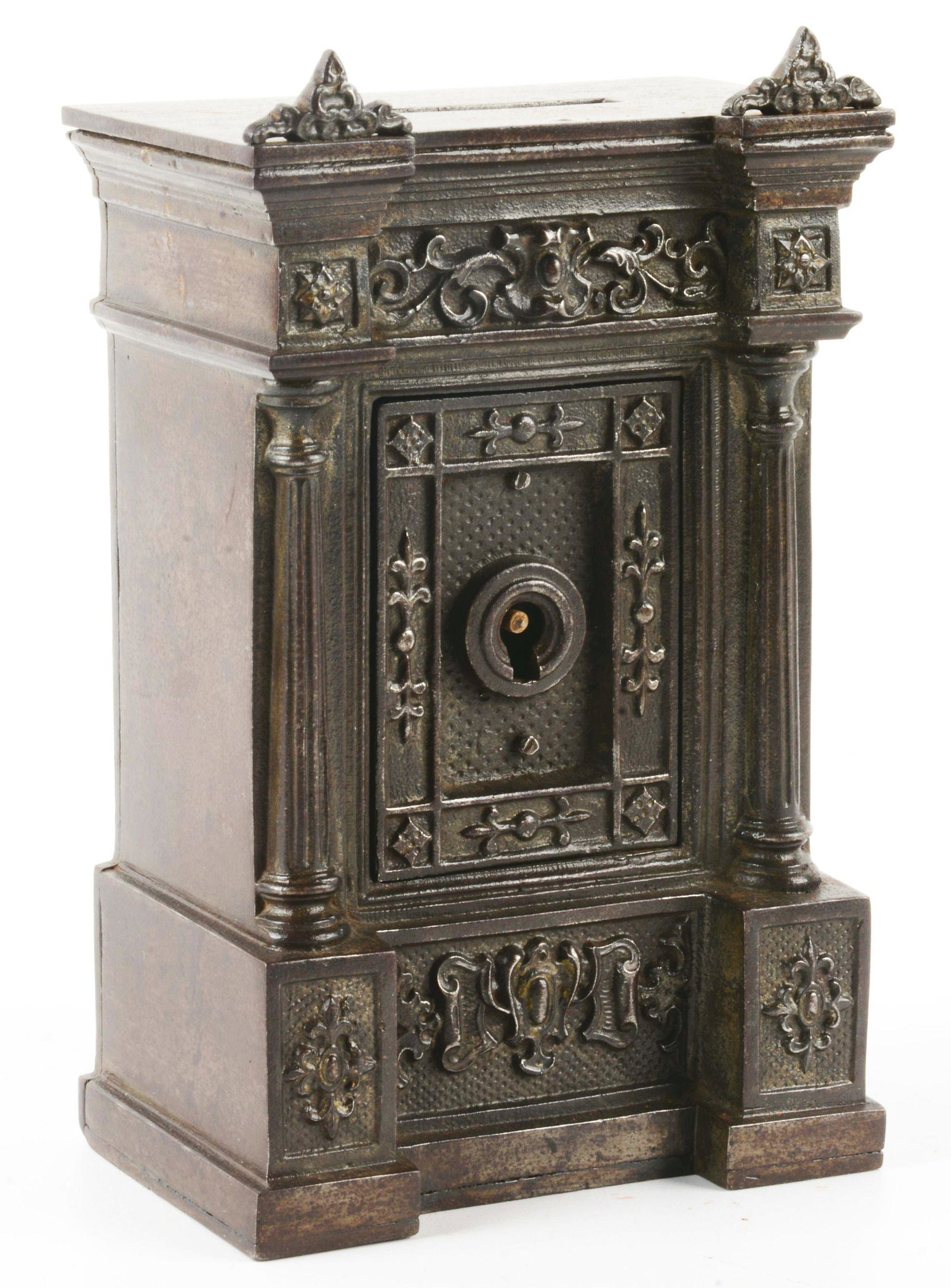 EUROPEAN KEY LOCK CAST IRON BANK.: Looks to have original key. Japanned. Nice embossment. Very little wear. Condition: (Very Good - Excellent). Dimensions: 3 - 7/8" x 2 - 1/4" x 6 - 3/8".