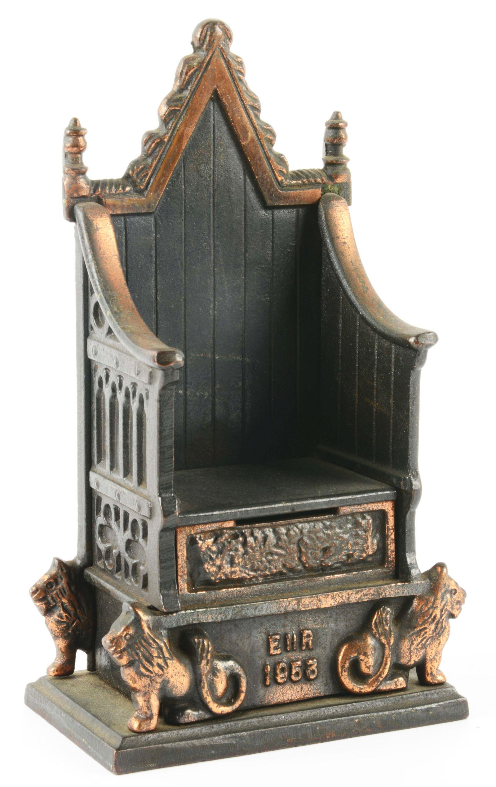 CORONATION THRONE MONEY BOX COIN BANK.: Made by Harper and marked "1953" for Queen Elizabeth's coronation with four molded lions around sides with some moderate wear. Condition: (Very Good). Dimensions: 4 - 1/2" x 2 - 5/8" x 8 - 1/4".