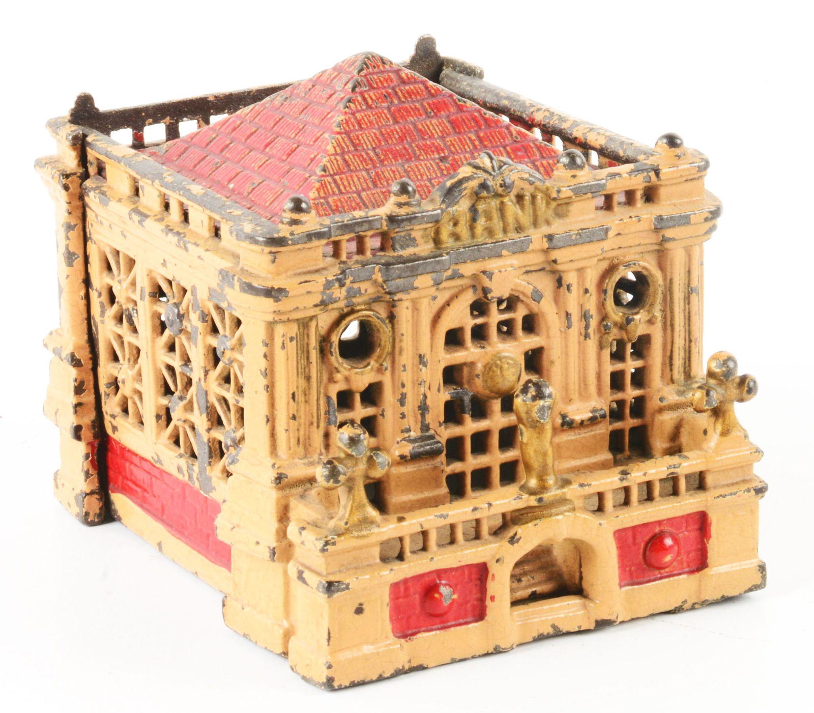 CAST IRON RED AND CREAM STILL BUILDING BANK. (1 of 3)