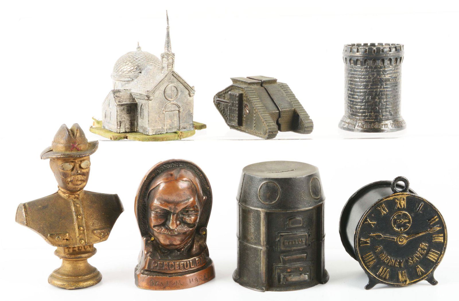 LOT OF 7: EUROPEAN AND AMERICAN WHITE METAL AND CAST IRON STILL BANKS. (1 of 3)